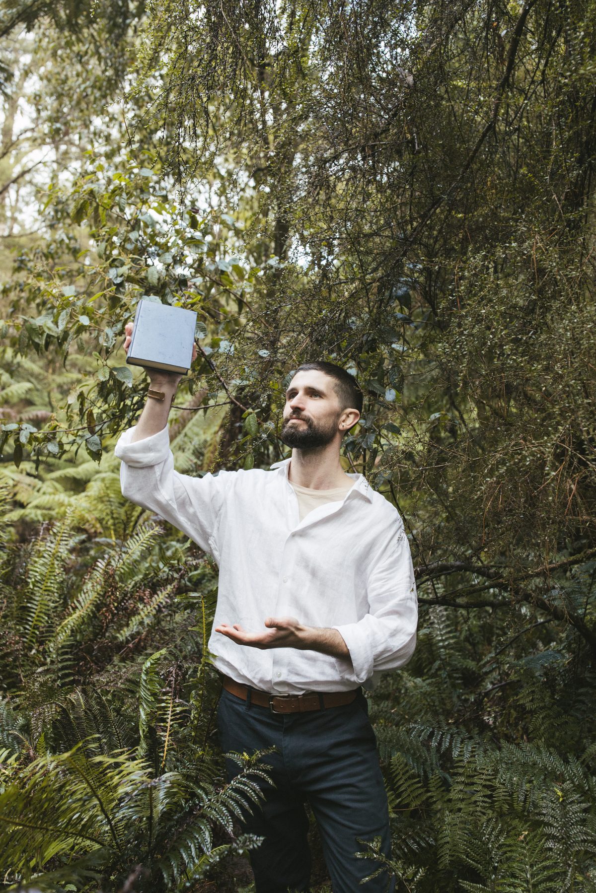 Jacob with a book in the forest